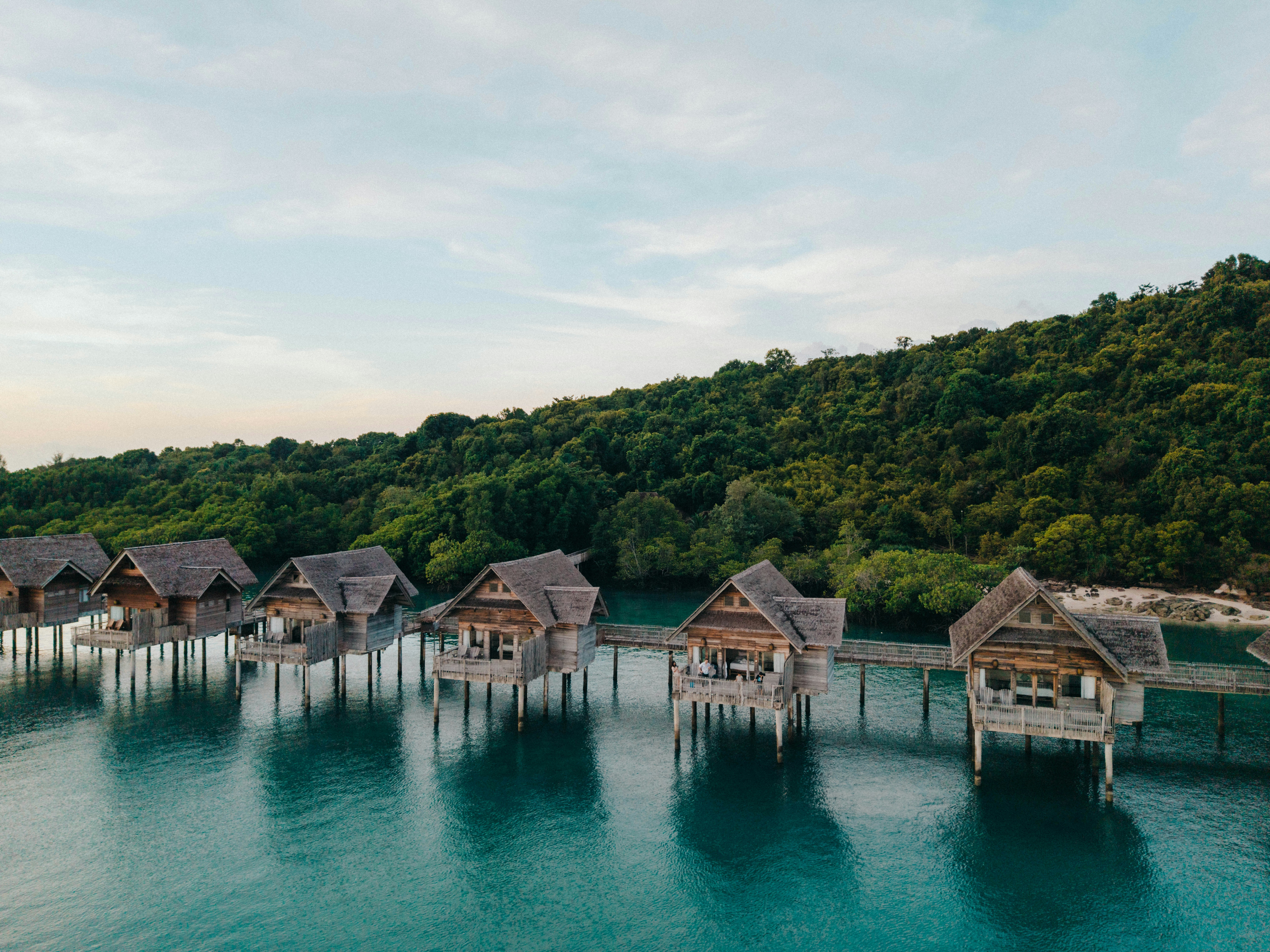 Our edit of hotels to book in October 4 DvpBPIaQeUeZEsvxATjJg Overwater Villas Aerial 1.jpg fmjpg